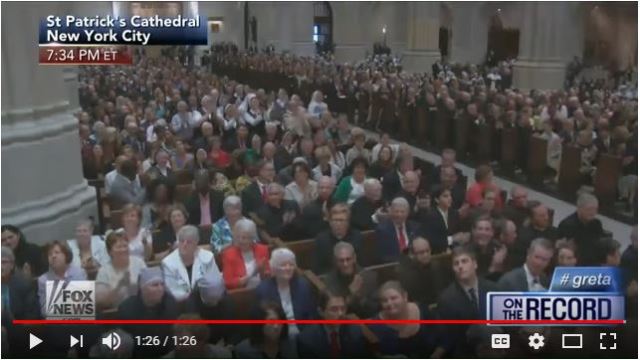 Capture - Over the head camera view of the crowds enthusiastically clapping to a blasphemous and heretical statement of Pope Francis