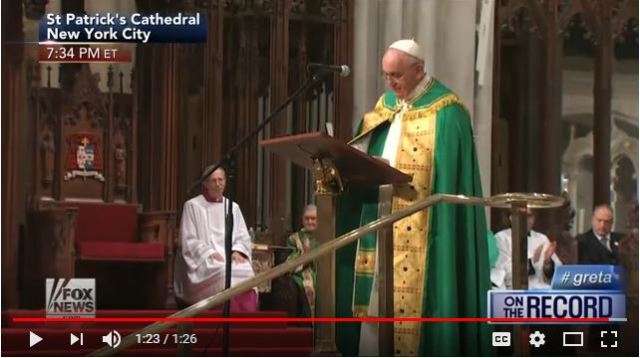 Capture - Pope Francis standing at the crowdz still clapping enthusiastically