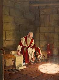 images -- the apostle john writing on a scroll