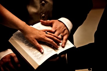 Wedding-rings-hands-on-bible