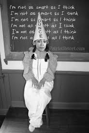image -- House of Representative Democratic Socialist Alexandria Ocasio-Cortez with a Dunce hat on