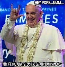 Pope Francis flashing Satanic hand signs