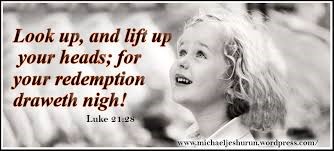 A little girl with Blonde Hair looking up with Luke 21 verse 28 written next to her