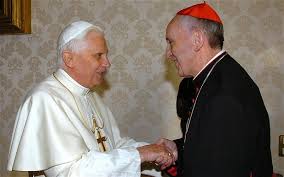 10.) A.) The Telegraph -- Pope Francis run-in with Benedict XVI -- They greet one another by holding hands